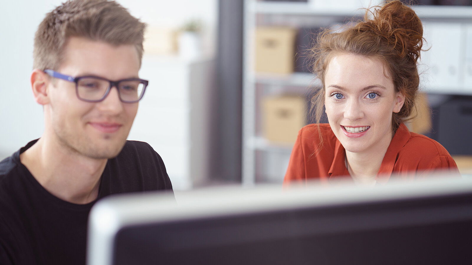 Attractive young woman working in the office